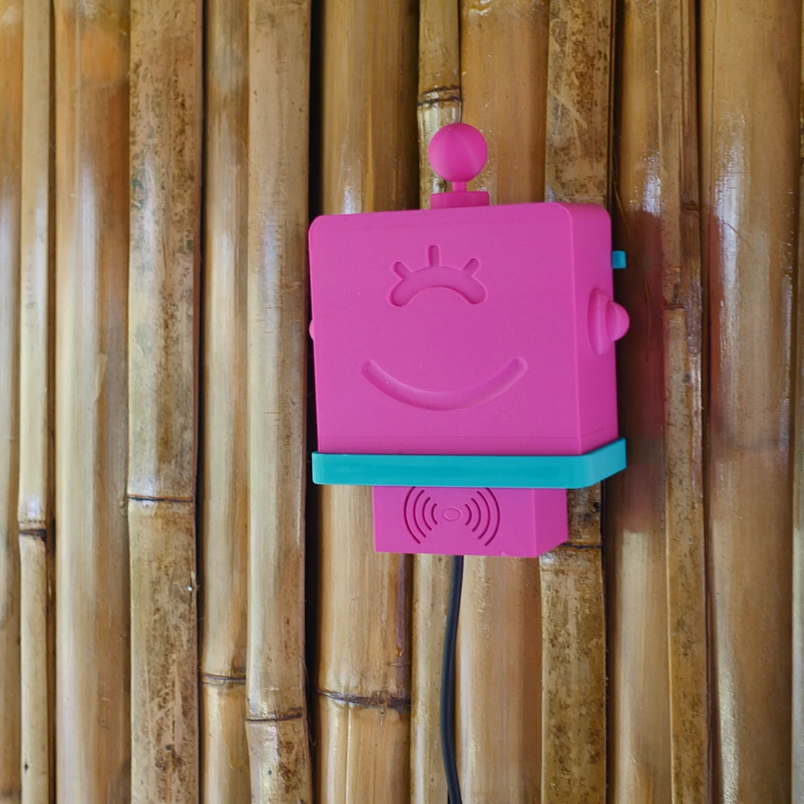 A pink Altruist mounted on a bamboo wall